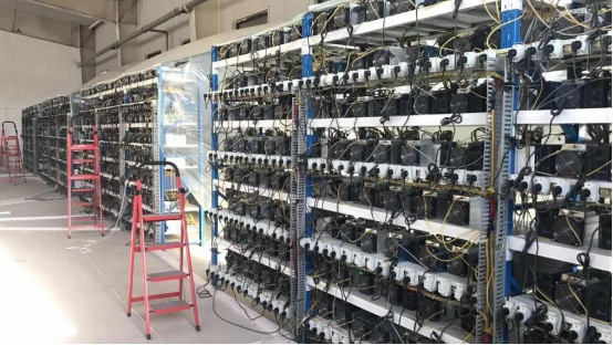 Cooling infrastructure in a large-scale mining farm supporting diverse cryptocurrency rigs